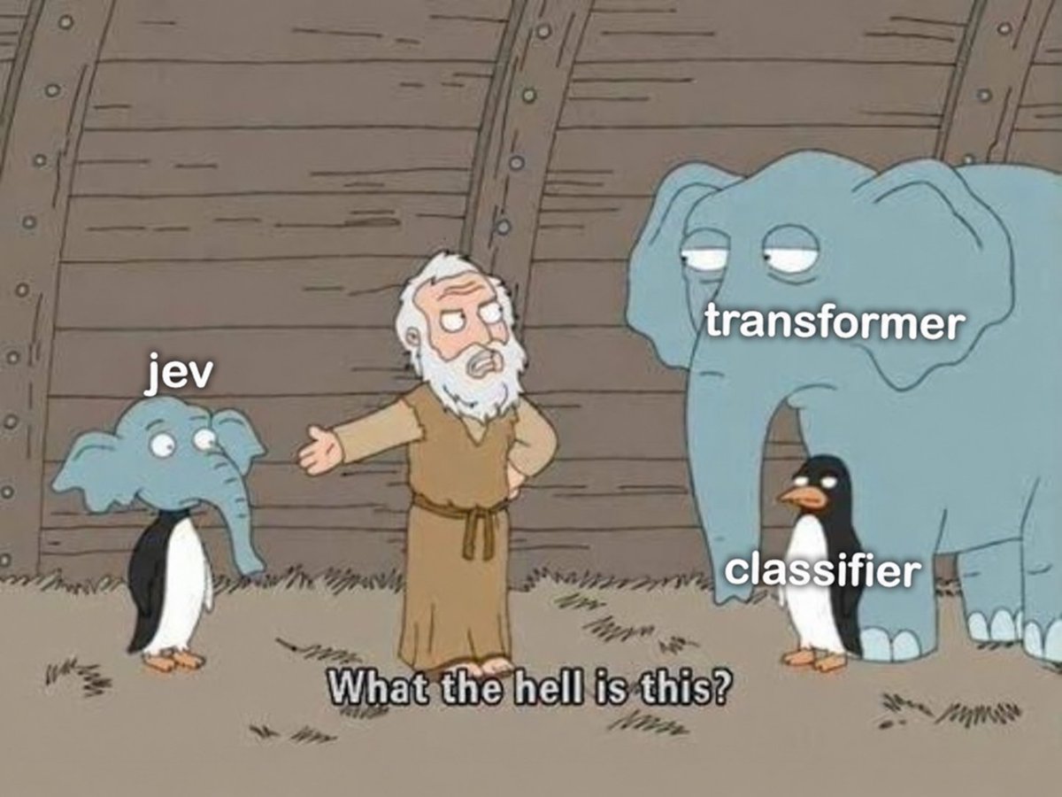 Jev standing beside a much larger transformer classifier in a humorous comparison meme